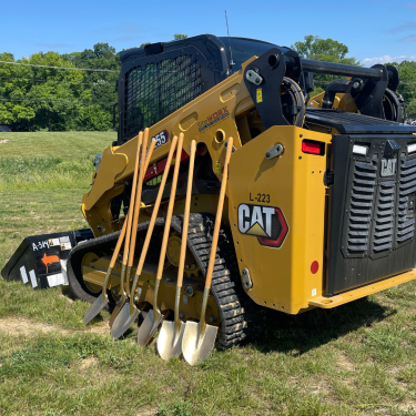 Golden shovels against excavator