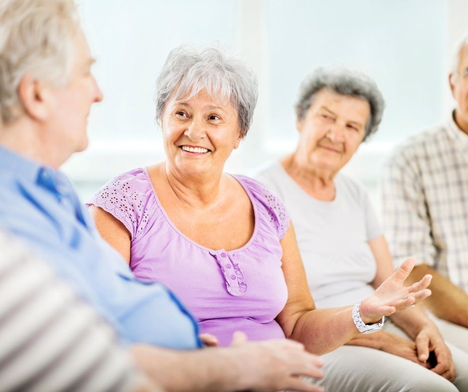 Group of seniors having a pleasant discussion