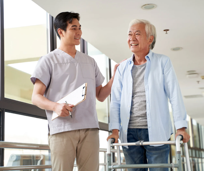 Nurse walking with elderly patient