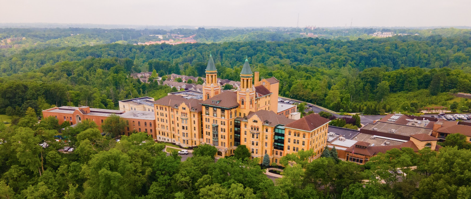 Aerial view of Twin Towers campus and the surrounding wooded area.