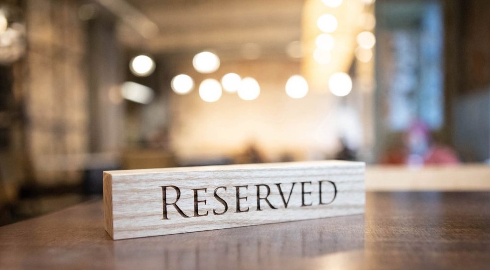 Table with reserved sign