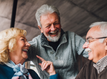 Older adults talking and smiling