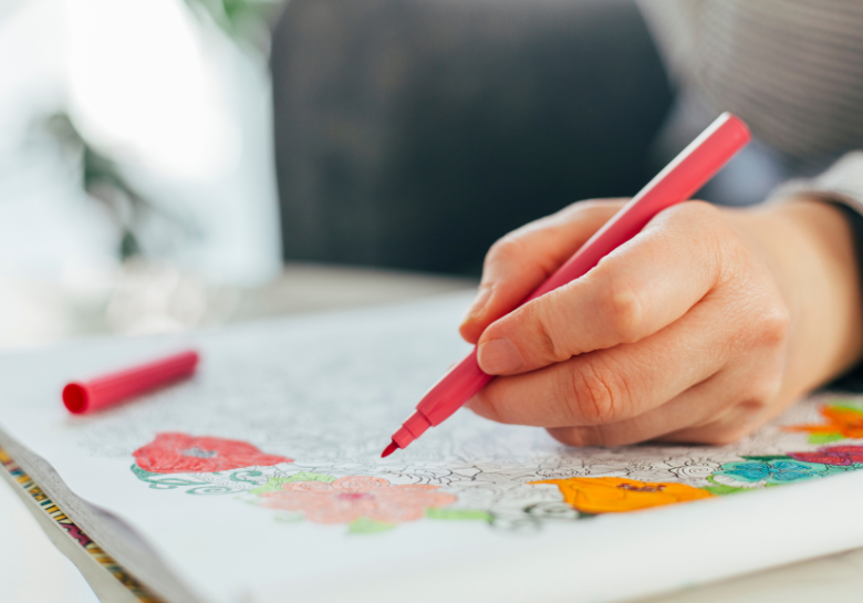 A person coloring