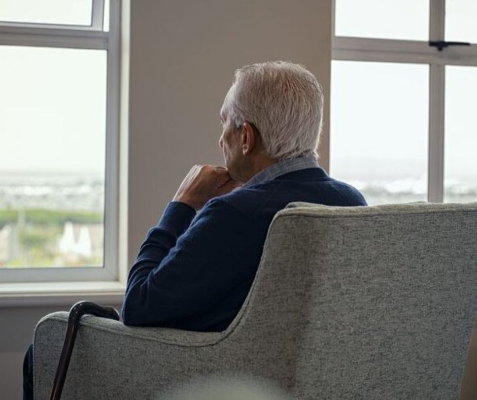 Senior man sitting alone in isolation