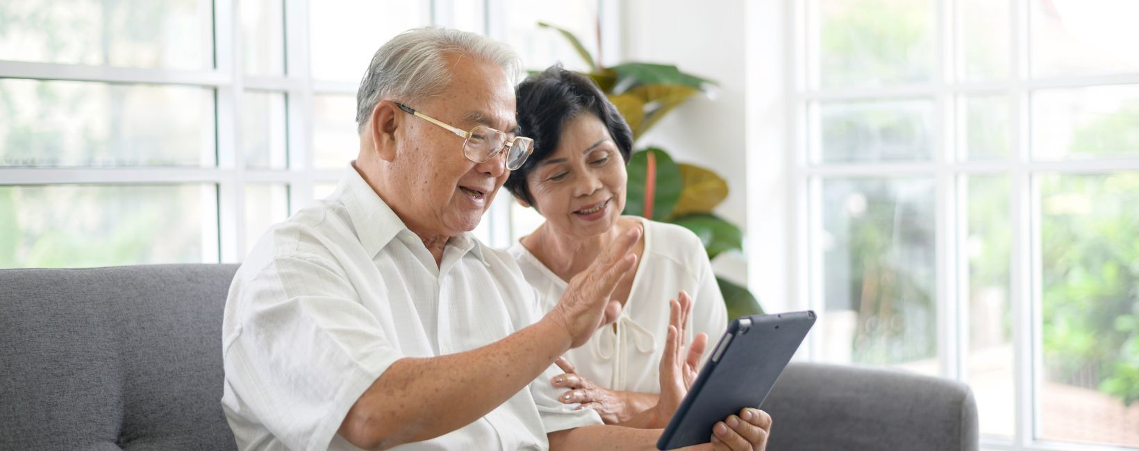 Older adult couple on tablet
