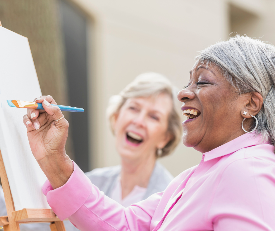 Older adult women doing art