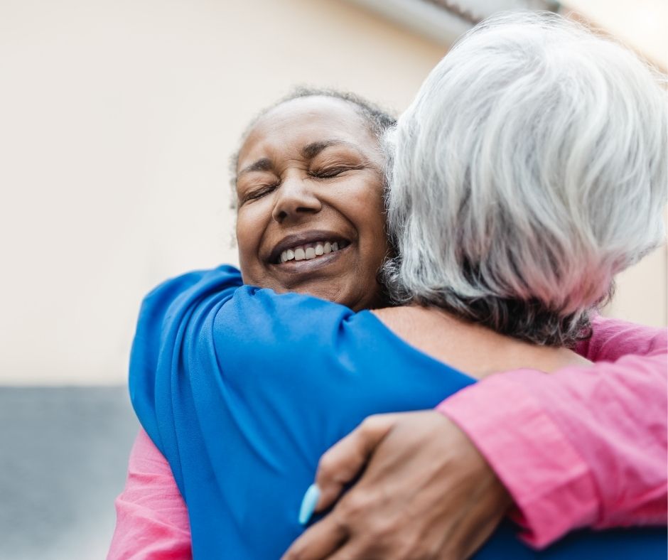 two women hugging