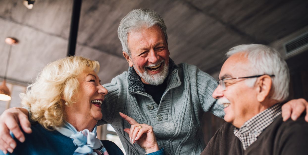 older adults smiling and laughing