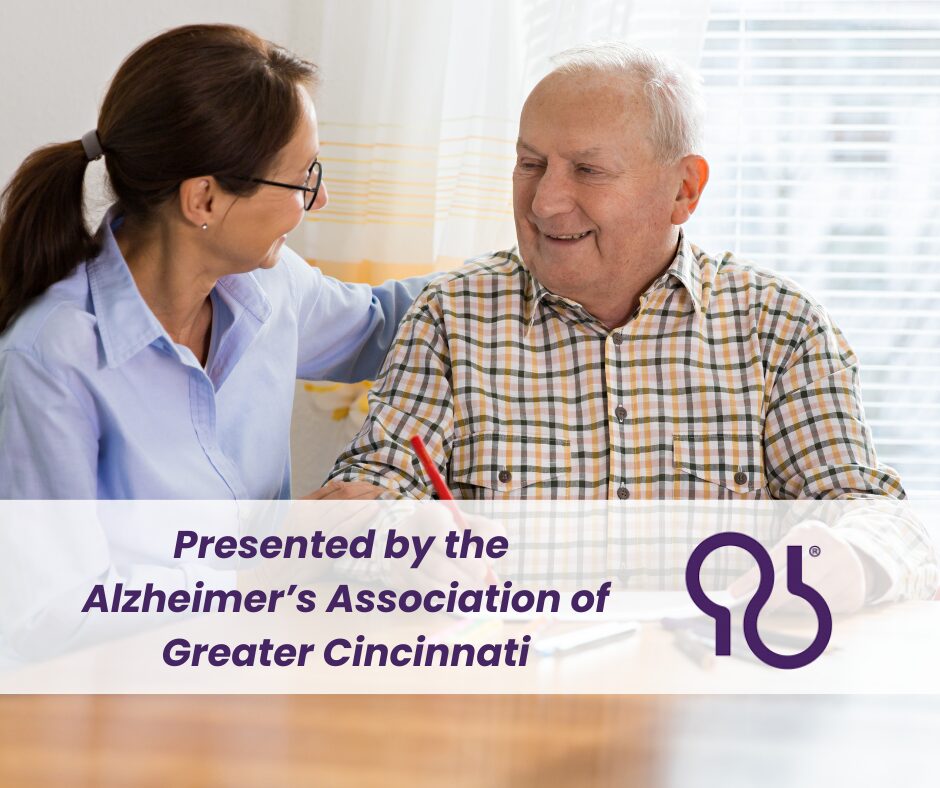 Older man and adult daughter sharing an embrace and talking.