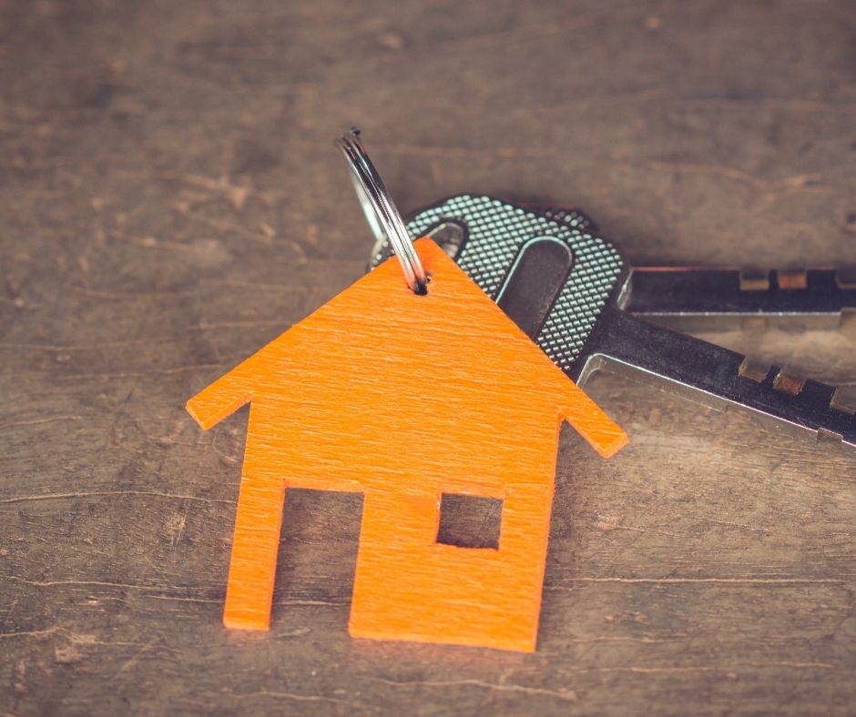 keys on a little wooden house