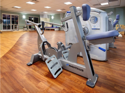 Wesley Glen's rehabilitation therapy area that includes exercise equipment