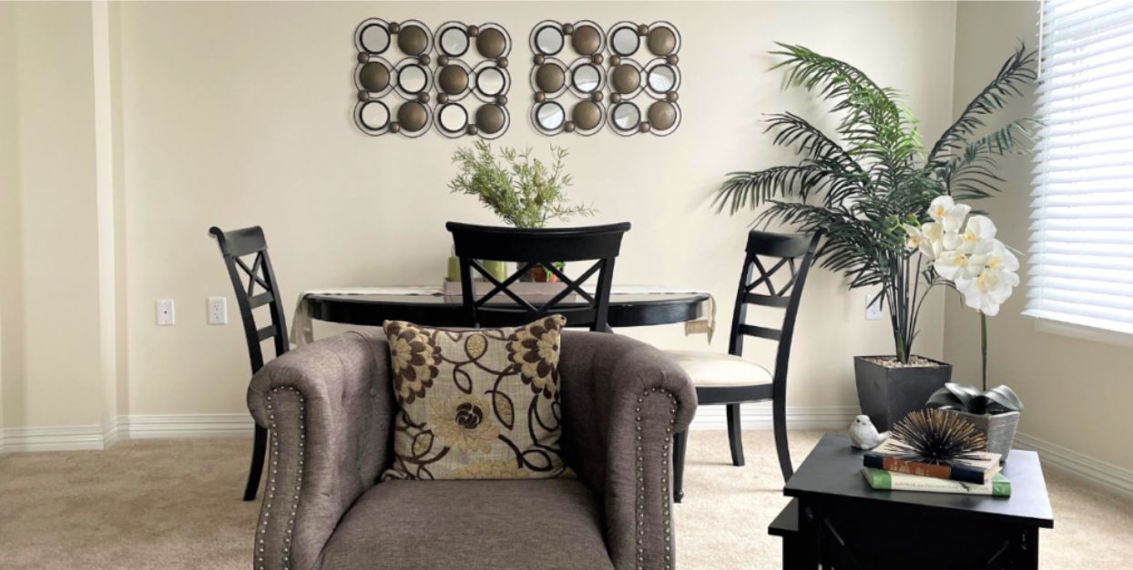 Living room and dining area of Wesley Glen senior apartment home