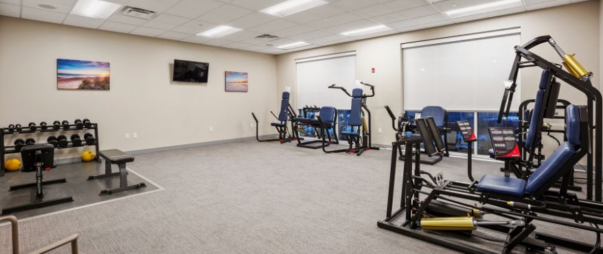 Fitness center at Harcum Fitness and Aquatic Center with weight machines